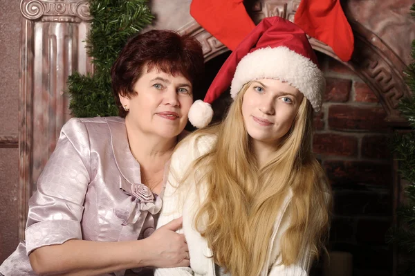 Christmas photo of mother and daughter — Stock Photo, Image