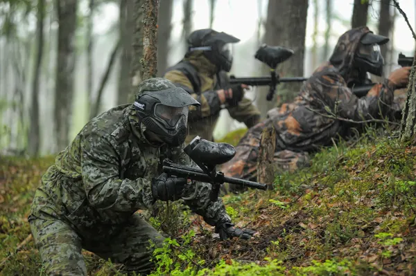 Paintball sport players during a game — Stock Photo, Image