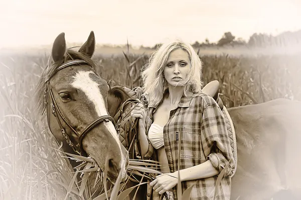 Sexy blonde with a horse — Stock Photo, Image