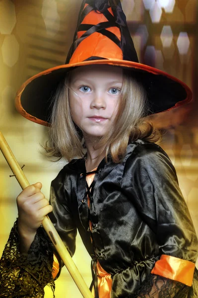 Girl in witch costume on Halloween — Stock Photo, Image