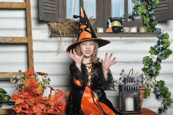 Girl in witch costume on Halloween — Stock Photo, Image