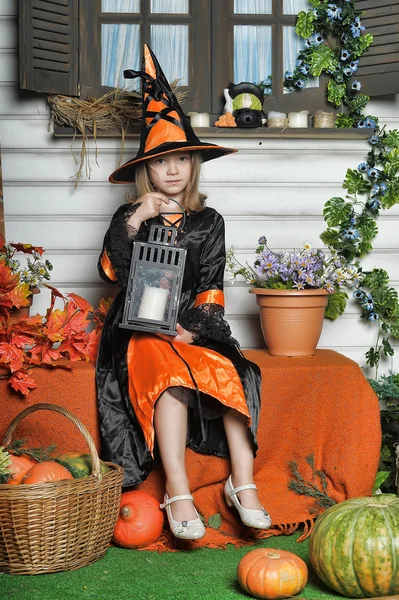 Girl in witch costume on Halloween — Stock Photo, Image