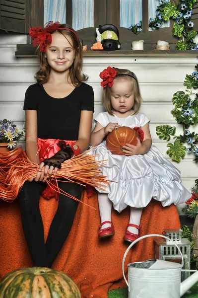 Girls in a suit of a witch — Stock Photo, Image