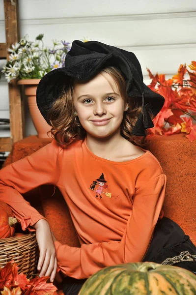 Girl with pumpkins — Stock Photo, Image