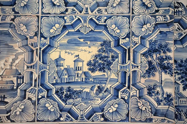 Blue white paintings on a tiled stove — Stock Photo, Image