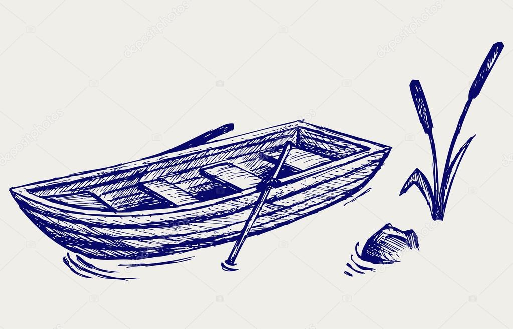 Wooden boat with paddles