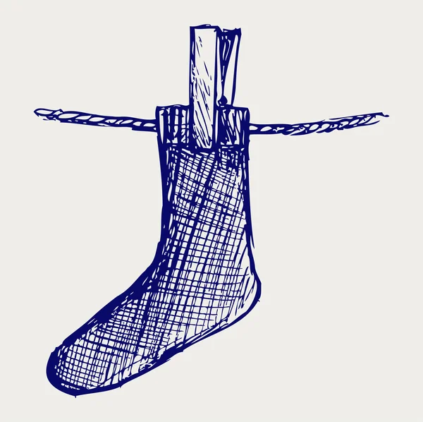 Chaussettes faites d'un clap dans la corde à linge — Image vectorielle