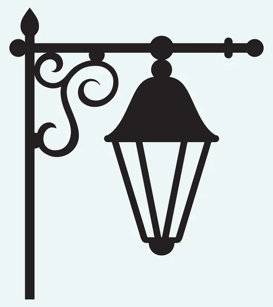 Lámpara de silueta de metal forjado — Vector de stock