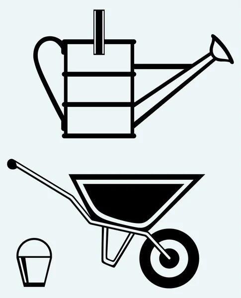 Garden wheelbarrow and watering can — Stock Vector