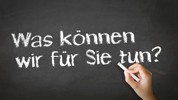 What can we do for you (In German) — Stock Photo, Image