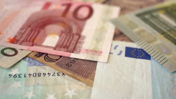 Euro bills and the word Money written In Spanish — Stock Video