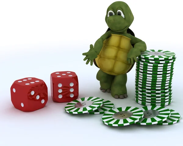 Tortoise with casino dice and chips — Stock Photo, Image