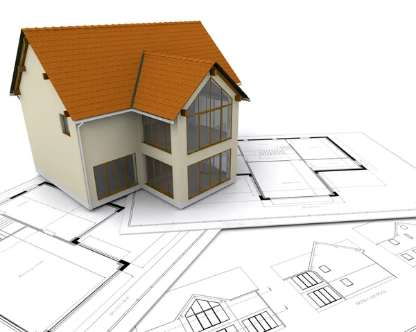 House on blueprints Stock Photo