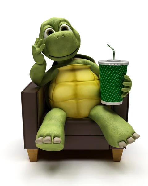 Tortoise relexing in armchair drinking a soda — Stock Photo, Image