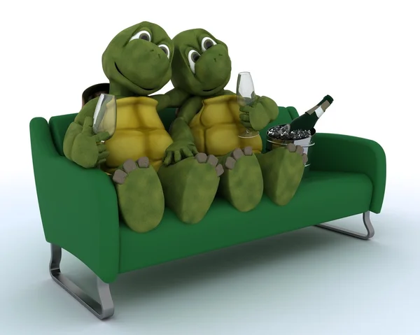 Tortoises on a sofa drinking champagne — Stock Photo, Image