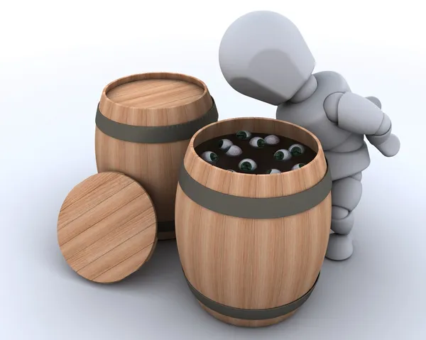 Man bobbing for eyeballs in a barrel — Stock Photo, Image