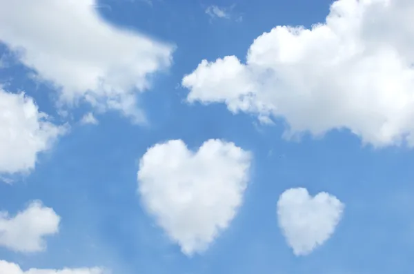 Shape of hearts in a blue sky — Stock Photo, Image