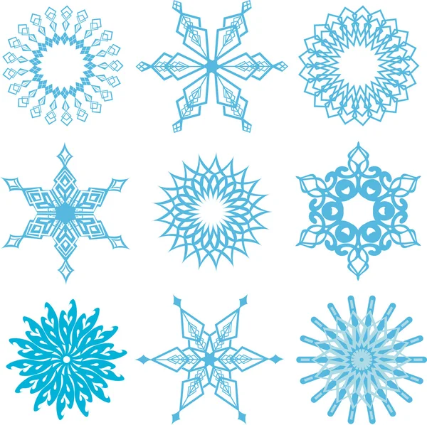 Diseños de copos de nieve — Vector de stock