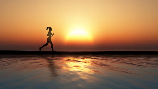Joggerin joggt gegen einen Sonnenuntergang — Stockfoto
