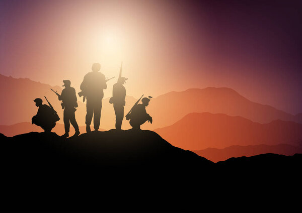 Silhouettes of soldiers on lookout in a sunset landscape