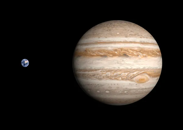 Planeterna jord och jupiter Stockbild