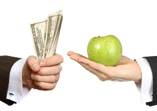 Hands with money and apple — Stock Photo, Image