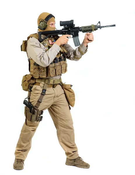 Soldier with rifle on a white background — Stock Photo, Image