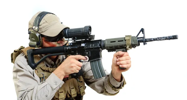 Soldier with rifle on a white background — Stock Photo, Image