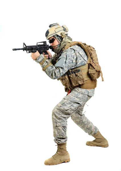 Soldier with rifle on a white background — Stock Photo, Image