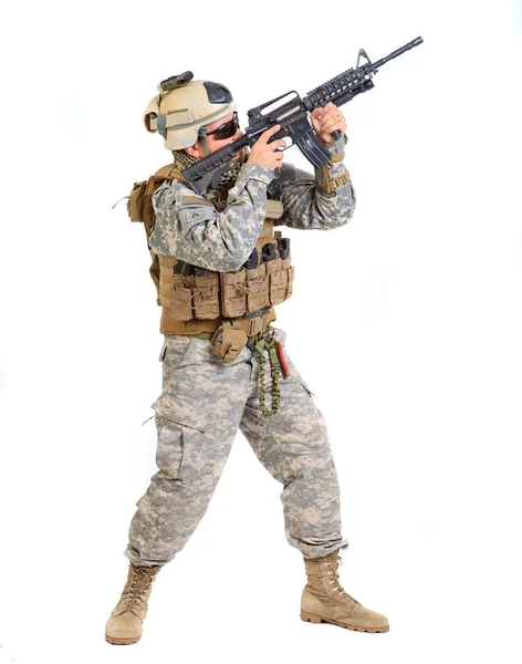 Soldier with rifle on a white background — Stock Photo, Image