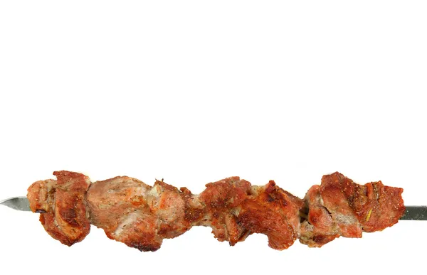 Slices of roast meat on a skewer — Stock Photo, Image