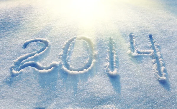 Año 2014 escrito en Snow in High Key —  Fotos de Stock