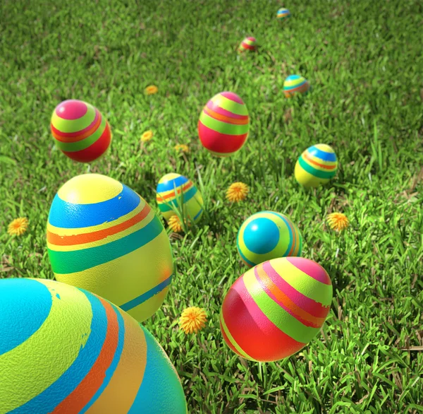 Huevos de Pascua caen sobre la hierba Imagen de stock