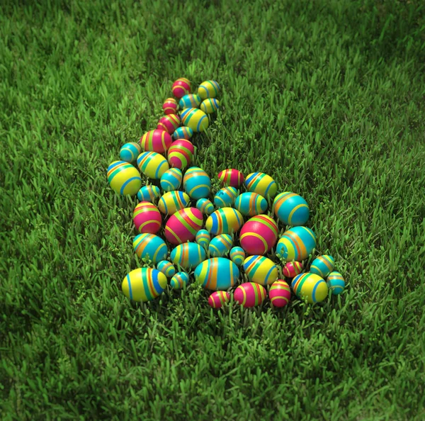 Conejo de Pascua de huevos en la hierba Fotos de stock libres de derechos