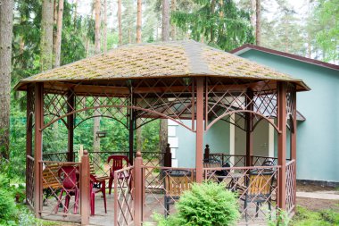 Gazebo in the garden area clipart