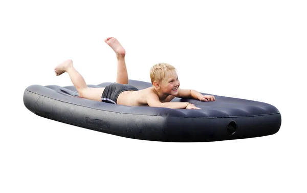 The child on an inflatable mattress — Stock Photo, Image