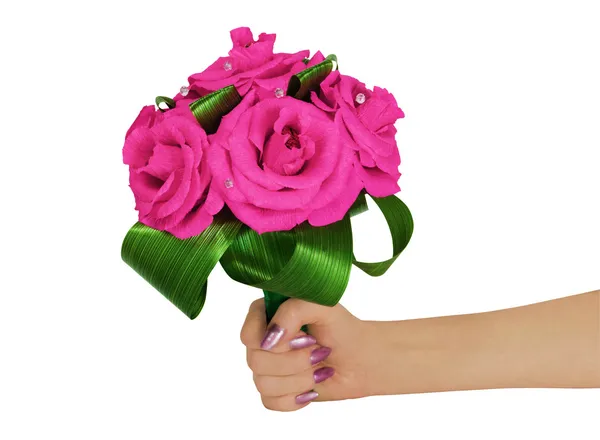 The bouquet consisting of artificial flowers in a female hand — Stock Photo, Image