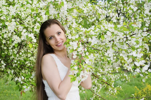 Beautiful  woman with apple tree — Stock Photo, Image