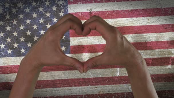 Символ сердца рук флаг США — стоковое видео