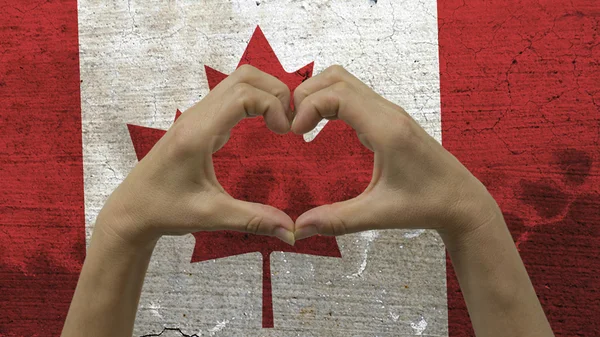 Handen hart symbool Canadese vlag — Stockfoto