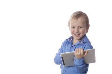 smiling boy with touch pad