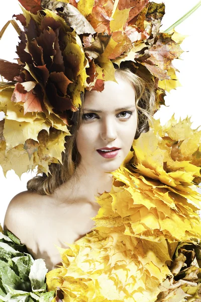 Young woman with yellow leaves — Stock Photo, Image