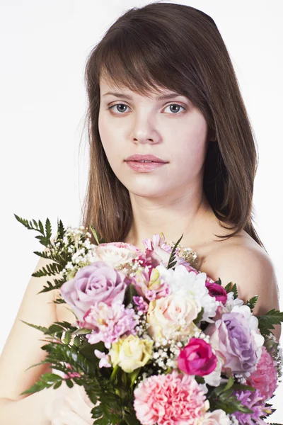 Young woman with bouquet — Stock Photo, Image
