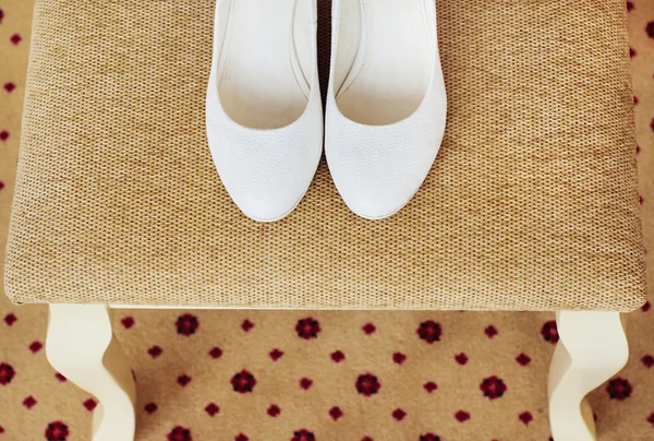 Beautiful white shoes from bride — Stock Photo, Image