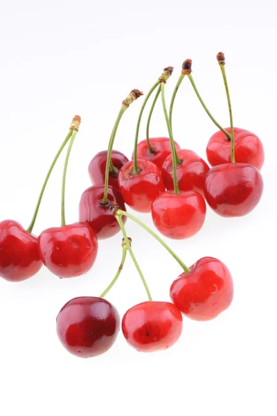 Cerezas dulces aisladas sobre un fondo blanco — Foto de Stock