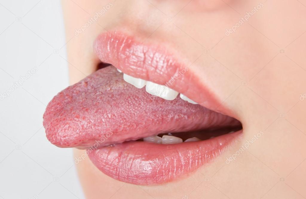 woman sticking her tongues out