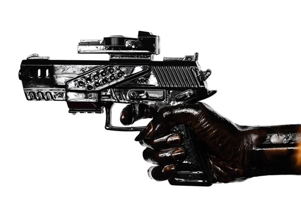 Χέρι που κρατά το όπλο που βάφονται με κινητήρα πετρελαίου — Φωτογραφία Αρχείου