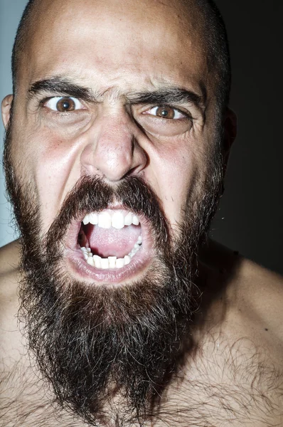 Man with beard with frightening expressions — Stock Photo, Image