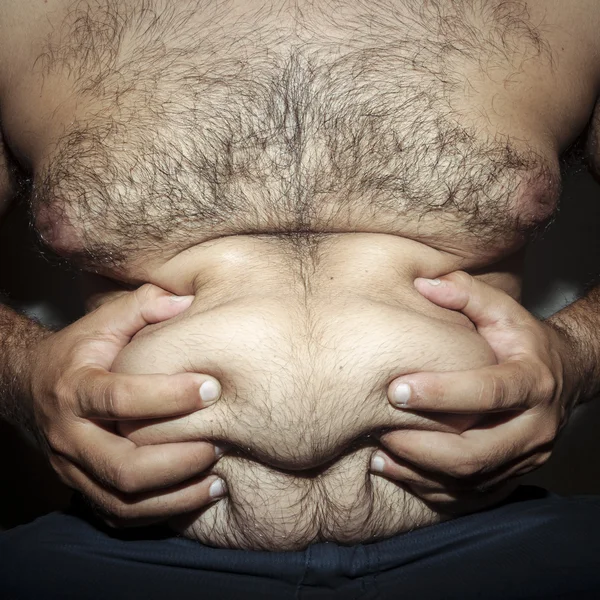 Bauchfetter und haariger Mann — Stockfoto