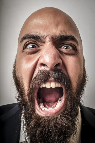 Elegant bearded man with jacket screaming — Stock Photo, Image